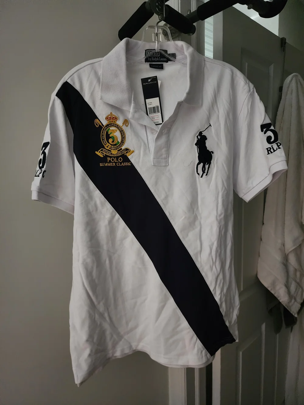 Ralph Lauren White Polo with Navy Diagonal Stripe and Embroidered Crest. S-M